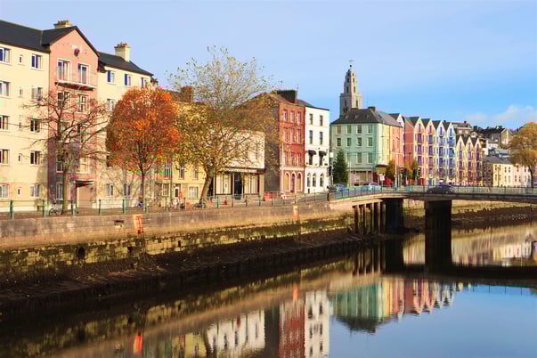 Buildings by river in Cork, Ireland